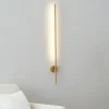 Applique longiligne dorée lumière LED - Mandal