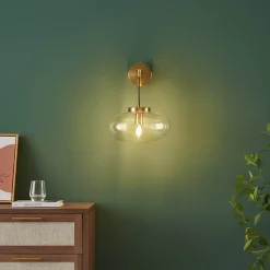 Applique murale dorée avec globe en verre soufflé suspendu - Milenzo