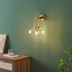 Applique murale dorée avec globe en verre soufflé suspendu - Milenzo