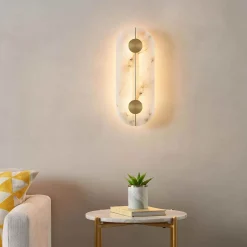 Applique murale ovale dorée LED avec abat-jour en albâtre - Calizia