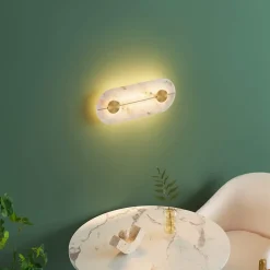 Applique murale ovale dorée LED avec abat-jour en albâtre - Calizia