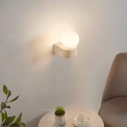 Applique murale sphérique en verre blanc sur socle en pierre - Oriane