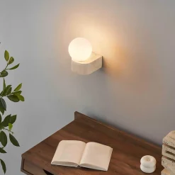 Applique murale sphérique en verre blanc sur socle en pierre - Oriane