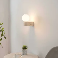 Applique murale sphérique en verre blanc sur socle en pierre - Oriane