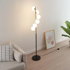 Lampadaire design noir et laiton sphères blanches - Sierra