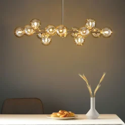 Lustre design doré chaleureux à 14 sphères - Osanna