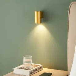 Petite applique murale cylindrique dorée - Liv