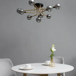 Plafonnier moderne noir et doré 9 boules en verre ambré - Merano