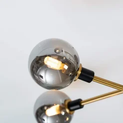 Plafonnier moderne noir et doré 9 boules en verre ambré - Merano