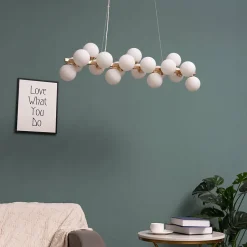 Suspension horizontale dorée à sphères en verre blanc - Ambrosia