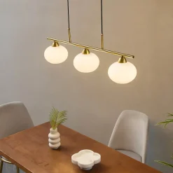 Suspension triple dorée abat-jours en verre blanc - Alcyone